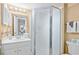 Clean bathroom with a vanity, toilet and glass shower, designed for convenience and comfort at 6200 N Ocean Blvd. # 203, North Myrtle Beach, SC 29582