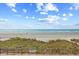 Scenic view of the beach featuring pristine sands, the ocean, and beach vegetation at 6200 N Ocean Blvd. # 203, North Myrtle Beach, SC 29582