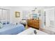 Charming bedroom features twin beds, coastal decor, and ample storage space, creating a welcoming retreat at 6200 N Ocean Blvd. # 203, North Myrtle Beach, SC 29582
