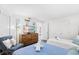 Bright bedroom featuring twin beds, beach-themed decor, and comfortable furnishings, creating a relaxing space at 6200 N Ocean Blvd. # 203, North Myrtle Beach, SC 29582