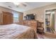 Spacious bedroom with natural light and a beautiful bed at 634 Melody Ln., Surfside Beach, SC 29575