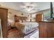 Primary bedroom featuring a ceiling fan, and an abundance of decorative wooden furniture at 634 Melody Ln., Surfside Beach, SC 29575
