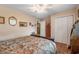Bedroom with closet, ceiling fan, and access to hall storage at 634 Melody Ln., Surfside Beach, SC 29575