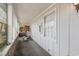 Long enclosed porch features a variety of decorative touches and plenty of natural light at 634 Melody Ln., Surfside Beach, SC 29575