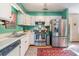 Functional kitchen design featuring stainless steel appliances, ample counter space, and classic cabinetry at 634 Melody Ln., Surfside Beach, SC 29575