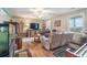 Open-concept living room with hardwood floors, a ceiling fan, and stylish furniture at 634 Melody Ln., Surfside Beach, SC 29575