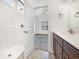 Bright bathroom with a shower and a view into the bedroom, featuring sleek countertops at 6392 Highway 378, Conway, SC 29527