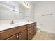 Bathroom with double vanity, sleek countertops, decorative lighting, and a toilet at 6392 Highway 378, Conway, SC 29527