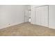 Cozy bedroom featuring neutral carpet, a closet, and an open doorway at 6392 Highway 378, Conway, SC 29527