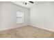 Bedroom with neutral carpet, ceiling fan, and bright window to provide lots of natural light at 6392 Highway 378, Conway, SC 29527
