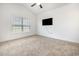 Cozy bedroom featuring a ceiling fan, and a TV mounted on the wall for entertainment at 6392 Highway 378, Conway, SC 29527