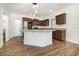 Modern kitchen with granite countertops, stainless steel appliances, and a convenient island at 6392 Highway 378, Conway, SC 29527