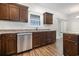 Beautiful kitchen with stainless steel dishwasher, matching countertops, and ample cabinet space at 6392 Highway 378, Conway, SC 29527