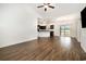 Spacious living area with hardwood floors that opens to the kitchen and dining area at 6392 Highway 378, Conway, SC 29527