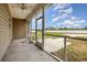 Relaxing screened porch providing views of the backyard and blue skies at 6392 Highway 378, Conway, SC 29527