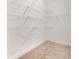 Spacious walk-in closet featuring white walls and wire shelving for ample storage space at 6392 Highway 378, Conway, SC 29527