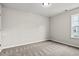Bedroom featuring neutral walls, carpet floors, and a window at 643 Snowy Owl Way, Conway, SC 29527