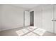 Bedroom featuring neutral walls, carpet floors, and closet at 643 Snowy Owl Way, Conway, SC 29527