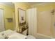 Bathroom with combination tub and shower, toilet and decorative items at 646 Tupelo Ln. # 4E, Longs, SC 29568