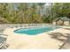 Community pool featuring a zero entry, sun loungers and a shaded pergola for residents to relax and enjoy at 646 Tupelo Ln. # 4E, Longs, SC 29568