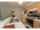 Kitchen featuring ample countertop space, neutral cabinets, and standard appliances at 646 Tupelo Ln. # 4E, Longs, SC 29568