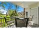 Charming patio area with views of lush greenery and community building at 679 Riverwalk Dr. # 201, Myrtle Beach, SC 29579