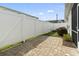 Fenced backyard featuring a brick patio and manicured landscaping for outdoor enjoyment and privacy at 800 Monarch Dr. # 46, Myrtle Beach, SC 29588