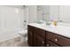 Well-lit bathroom featuring a shower-tub combo, modern vanity, and neutral color scheme at 800 Monarch Dr. # 46, Myrtle Beach, SC 29588