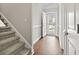 Bright entryway with wooden floors, stairs and view of the outside at 800 Monarch Dr. # 46, Myrtle Beach, SC 29588