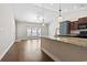 Kitchen with granite countertops, modern appliances, and hardwood floors at 800 Monarch Dr. # 46, Myrtle Beach, SC 29588