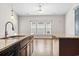 View from the kitchen island with granite countertops looking towards the bright dining nook at 800 Monarch Dr. # 46, Myrtle Beach, SC 29588
