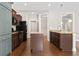 Well-equipped kitchen with granite countertops, island, and stainless steel appliances at 800 Monarch Dr. # 46, Myrtle Beach, SC 29588