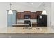 Spacious kitchen featuring granite countertops, pendant lighting and ample cabinet space at 800 Monarch Dr. # 46, Myrtle Beach, SC 29588