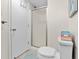 Compact bathroom with shower, toilet and towel rack at 806 N Waccamaw Dr. # 104, Murrells Inlet, SC 29576