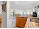 Open kitchen featuring granite countertops and seamlessly connected to the dining and living areas at 806 N Waccamaw Dr. # 104, Murrells Inlet, SC 29576