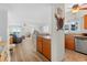 Open concept living space seamlessly integrates the kitchen and living room at 806 N Waccamaw Dr. # 104, Murrells Inlet, SC 29576