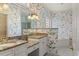 Bathroom featuring granite countertops and floral wallpaper at 808 East Coast Ln., North Myrtle Beach, SC 29582