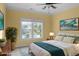 Bedroom featuring a queen bed, large window, and staging decor at 808 East Coast Ln., North Myrtle Beach, SC 29582
