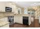 Spacious kitchen boasts stainless steel appliances, granite countertops, and a functional design with an open floor plan at 808 East Coast Ln., North Myrtle Beach, SC 29582