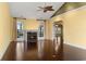 Bright living room featuring hardwood floors and a fireplace, with large windows bringing in lots of natural light at 808 East Coast Ln., North Myrtle Beach, SC 29582
