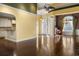 Spacious living area with hardwood floors, columns, lots of natural light, and an open doorway to the foyer at 808 East Coast Ln., North Myrtle Beach, SC 29582