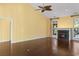 Living room with hardwood floors, recessed lighting, ceiling fan and a cozy fireplace at 808 East Coast Ln., North Myrtle Beach, SC 29582