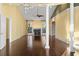 Bright living room boasting a fireplace, hardwood floors, and vaulted ceiling with lots of natural light at 808 East Coast Ln., North Myrtle Beach, SC 29582