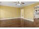 Unfurnished living room featuring hardwood floors, natural light, and neutral paint scheme at 808 East Coast Ln., North Myrtle Beach, SC 29582