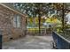 Brick patio surrounded by lush landscaping offers a private outdoor retreat at 808 East Coast Ln., North Myrtle Beach, SC 29582