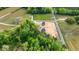 An aerial shot showing two houses and a tree-lined street running alongside the plots of land at 814 S Midway Hwy., Johnsonville, SC 29555