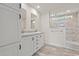 Bathroom with dual sink vanity, lots of drawer space, and walk in tile shower at 814 S Midway Hwy., Johnsonville, SC 29555