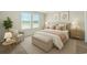 A modern staged bedroom with two windows, cozy decor, a comfortable bed and elegant furniture at 814 S Midway Hwy., Johnsonville, SC 29555