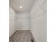 Walk-in closet with carpet flooring and wire shelving for ample storage at 814 S Midway Hwy., Johnsonville, SC 29555