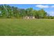 Charming single-story home surrounded by lush greenery and a spacious, well-maintained lawn at 814 S Midway Hwy., Johnsonville, SC 29555